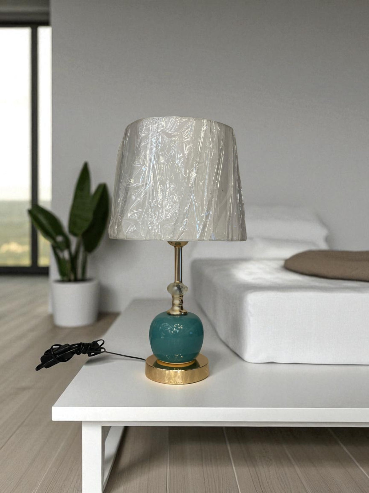 The Celestine Radiant Brass Orb Lamp