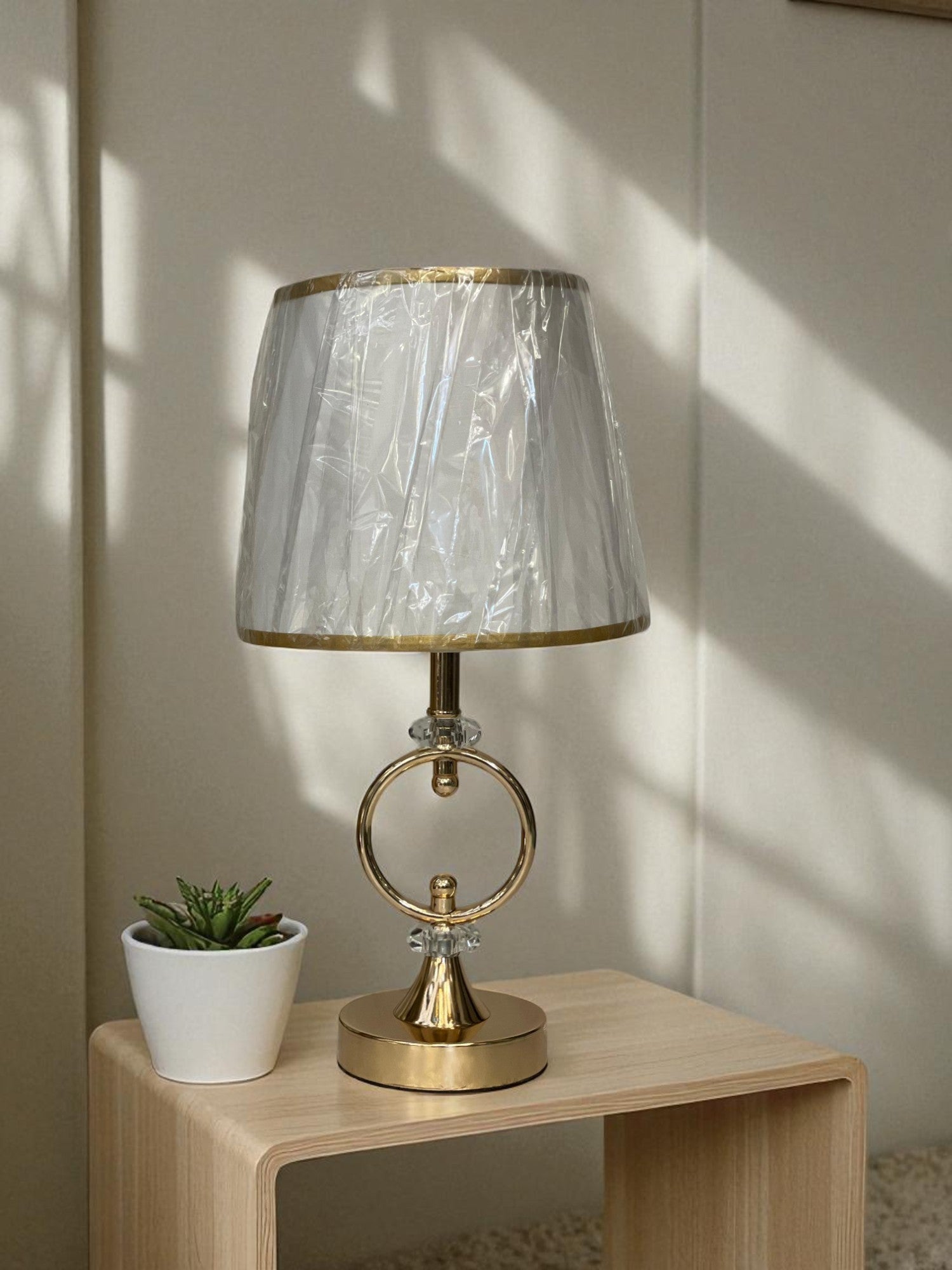The Nova Twin-Tier Brass Lamp