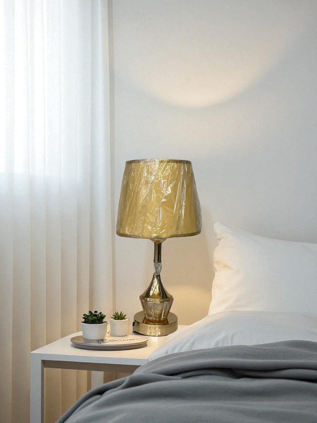 The Delphine Brass Crystal Lamp